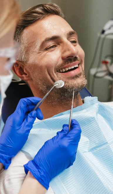 White Oak Dental
man smiling in a dental chair